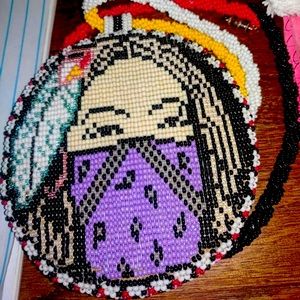Handmade beadwork Native American double sided medallion